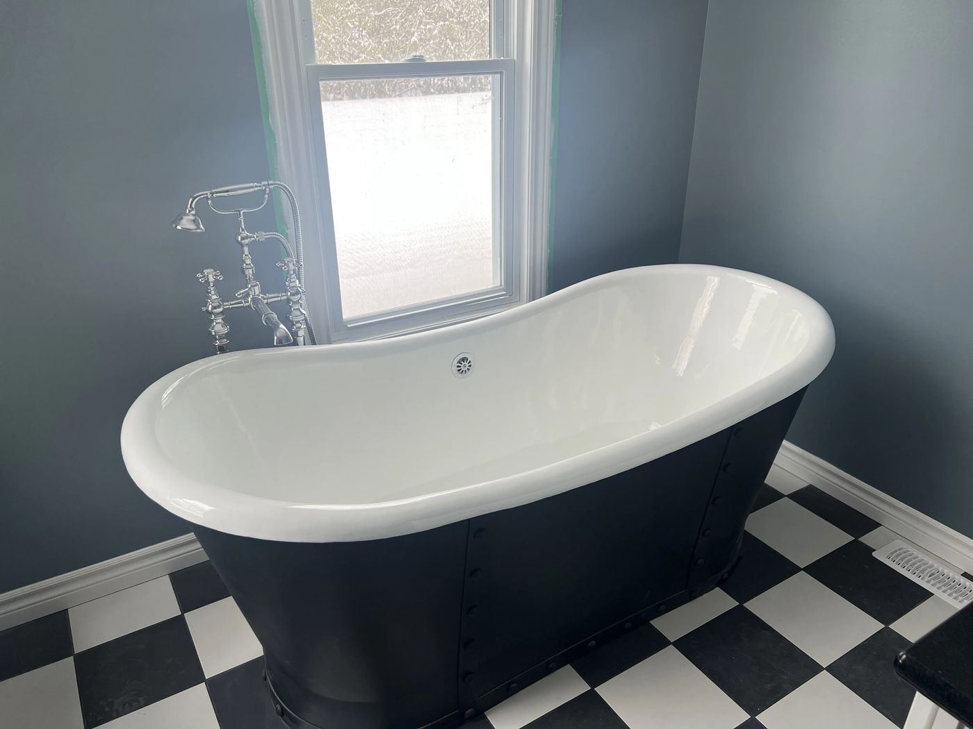 Freestanding Tub on Checkerboard Floor